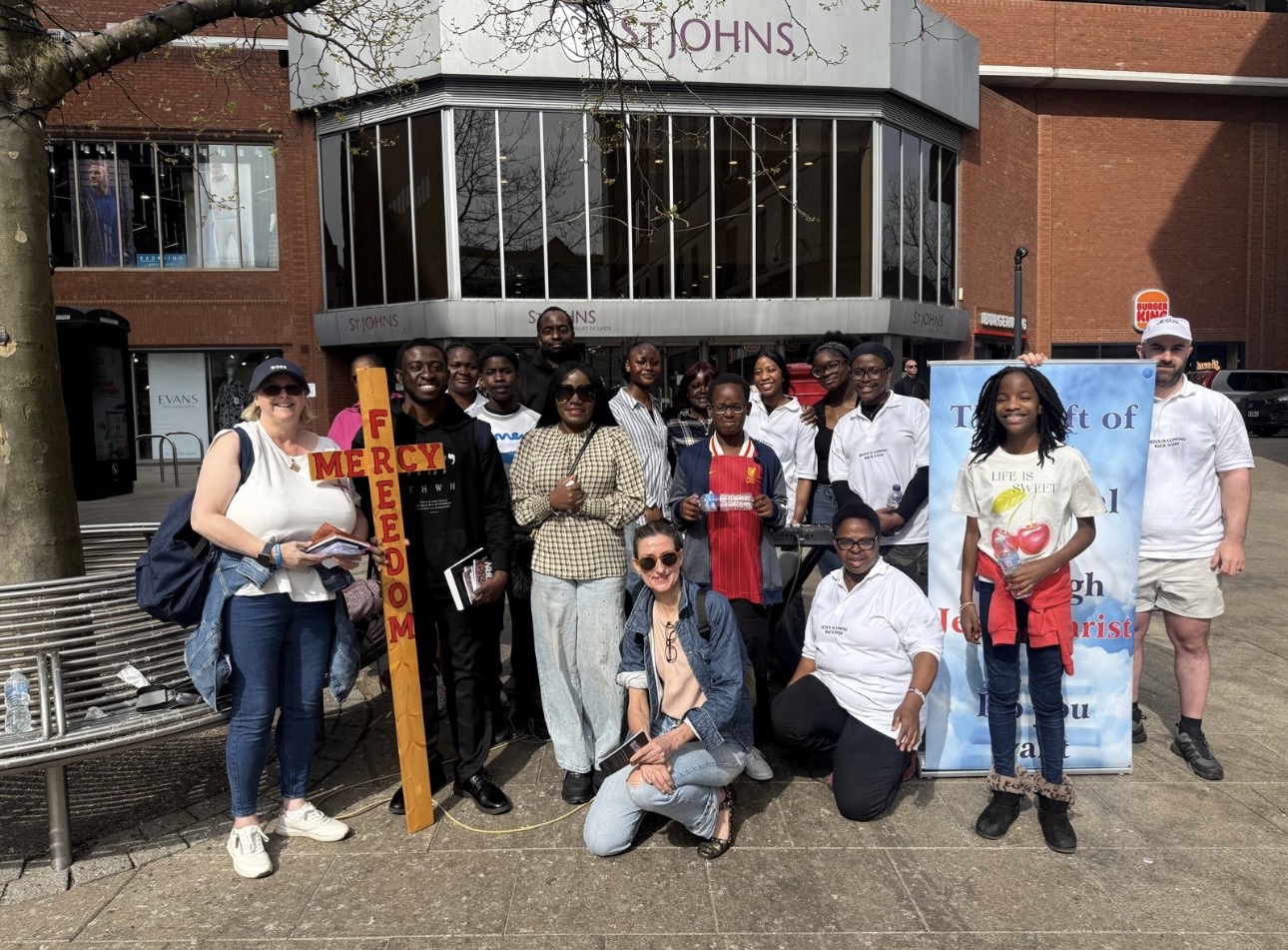 Evangelism team sharing the gospel